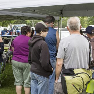 people by informational booth
